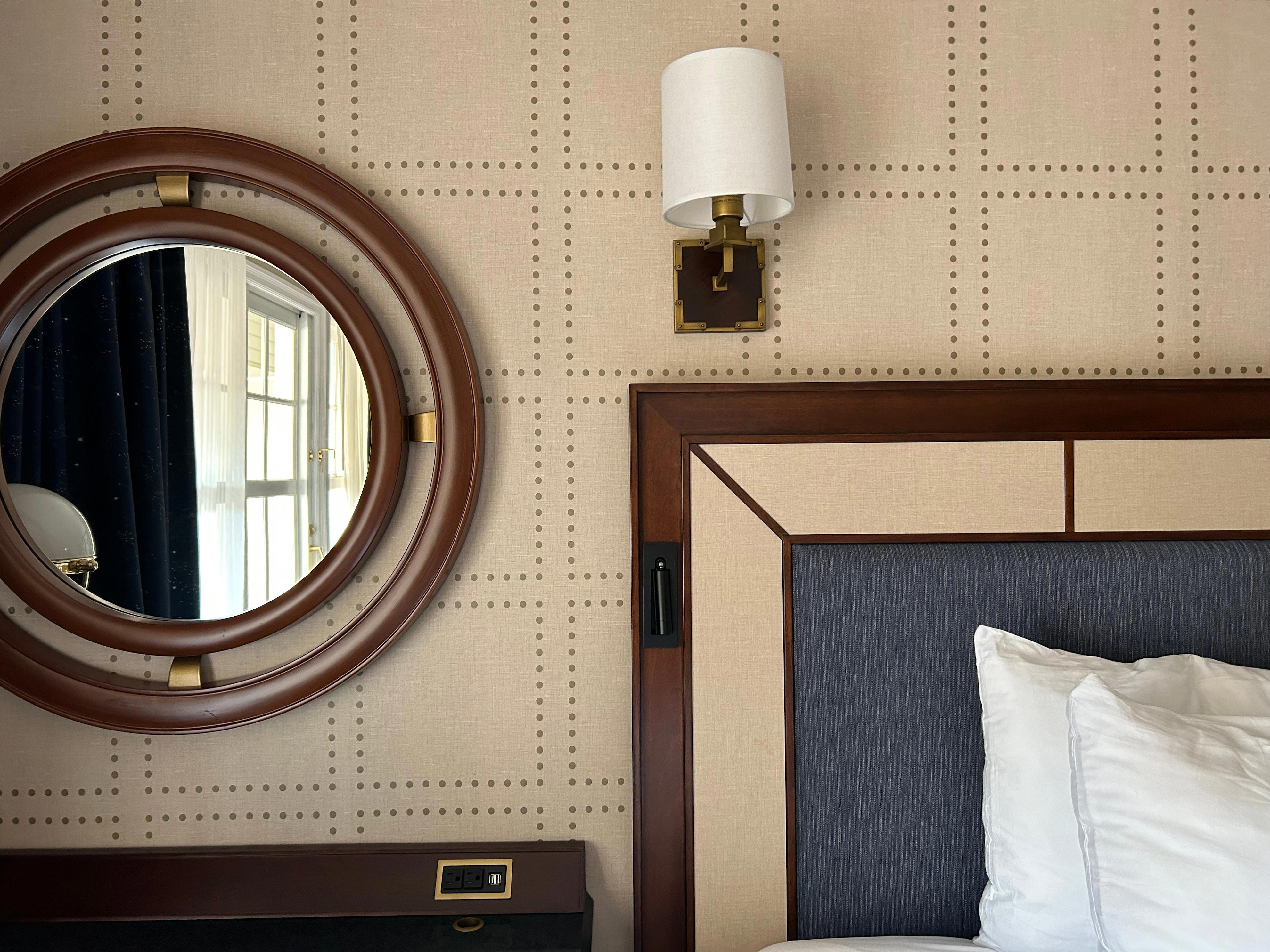 <p>I appreciated the conveniently placed reading lights built into the headboards and ample plugs for charging devices near the beds. My room also had a writing desk. </p>