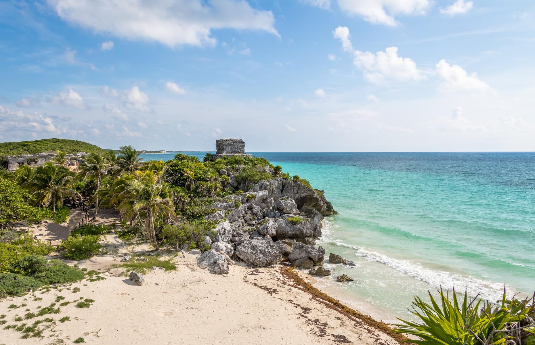 <p>Why choose between beautiful beaches, lush vegetation and ancient ruins when you can enjoy them all at once? Tulum is the only coastal Maya city and is popular with tourists thanks to its laid-back, New Age vibe. When you tire of lounging by the sea, head to the Castillo (pictured), perched on the edge of a 39-foot-high (12m) limestone cliff. Just be careful negotiating the steep steps on your way down.</p>  <p><a href="https://www.loveexploring.com/galleries/75464/the-worlds-most-dangerous-beaches?page=1"><strong>These are the most dangerous beaches in the world</strong></a></p>