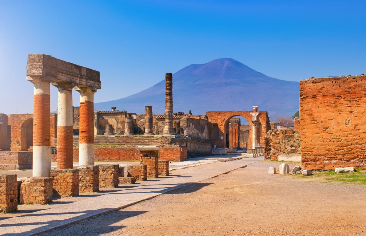 <p>Pompeii, the most visited archaeological site in the world, is not to be missed. You can reach the UNESCO World Heritage Site easily from Naples or Sorrento, or even on a day trip from Rome.</p> <p>At the base of Mount Vesuvius lies the remains of the city of Pompeii, devastated when Vesuvius erupted in 79 A.D. It is one of the best-preserved examples of ancient life we can see today.</p> <p>Walking around Pompeii gives you a feeling of what life was like almost 2,000 years ago. You can see houses, shops, public spaces, and most tragically, plaster casts of the bodies of people who called Pompeii their home before the cataclysmic event interred them in ash.</p> <h3>Get smarter with your money!</h3> <p>Want the best money-news and tips to help you make more and spend less? Then <a href="https://www.moneytalksnews.com/?utm_source=msn&utm_medium=feed&utm_campaign=blurb#newsletter" rel="noopener">sign up for the free Money Talks Newsletter</a> to receive daily updates of personal finance news and advice, delivered straight to your inbox. <a href="https://www.moneytalksnews.com/?utm_source=msn&utm_medium=feed&utm_campaign=blurb#newsletter" rel="noopener">Sign up for our free newsletter today.</a></p> <p class="disclosure"><em>Advertising Disclosure: When you buy something by clicking links on our site, we may earn a small commission, but it never affects the products or services we recommend.</em></p>