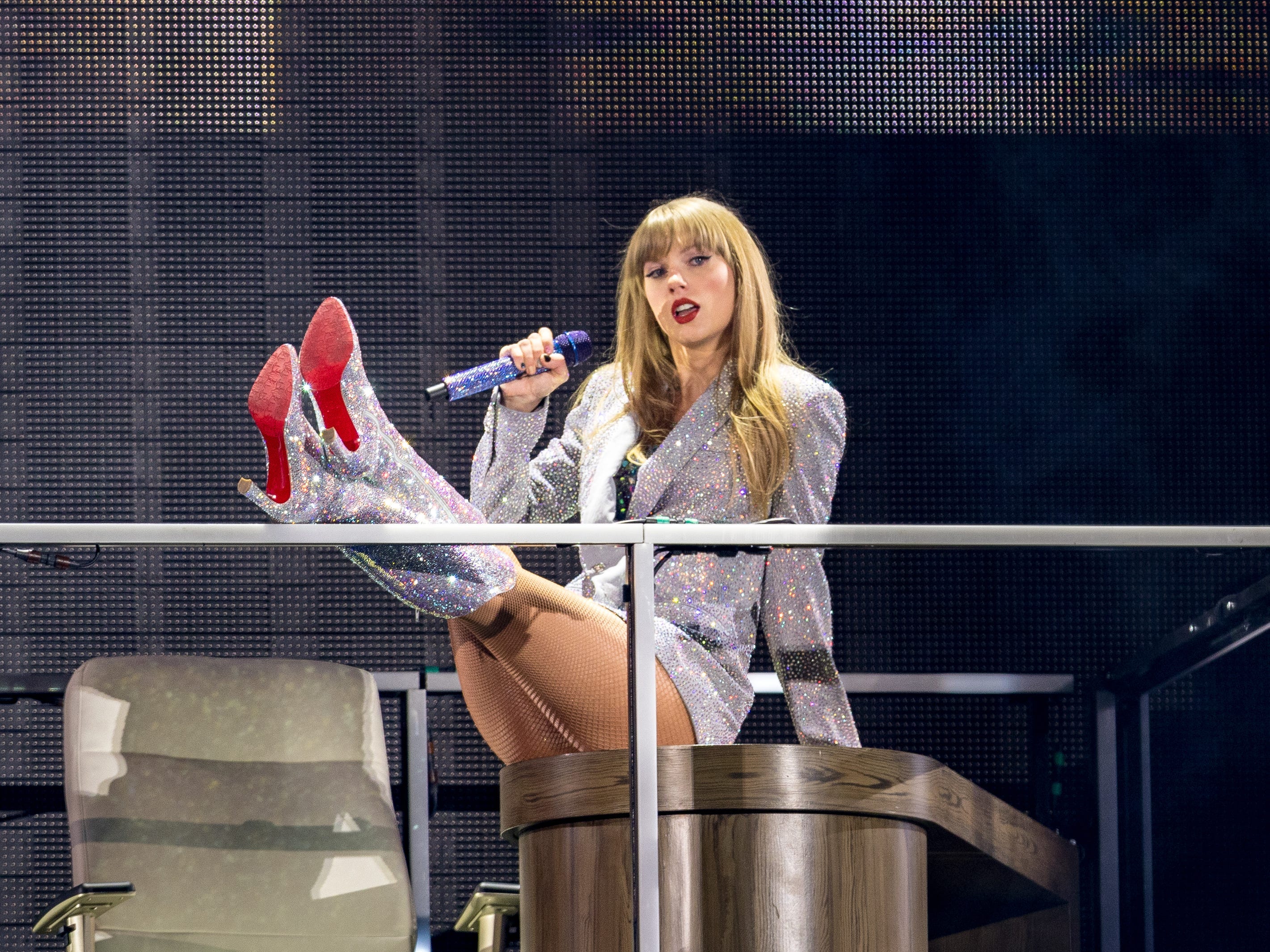<p>Swift typically slips on a silver blazer over her "Lover" bodysuit to perform "The Man" and "You Need to Calm Down." With the matching red-bottomed boots, it's a powerful combination.</p>