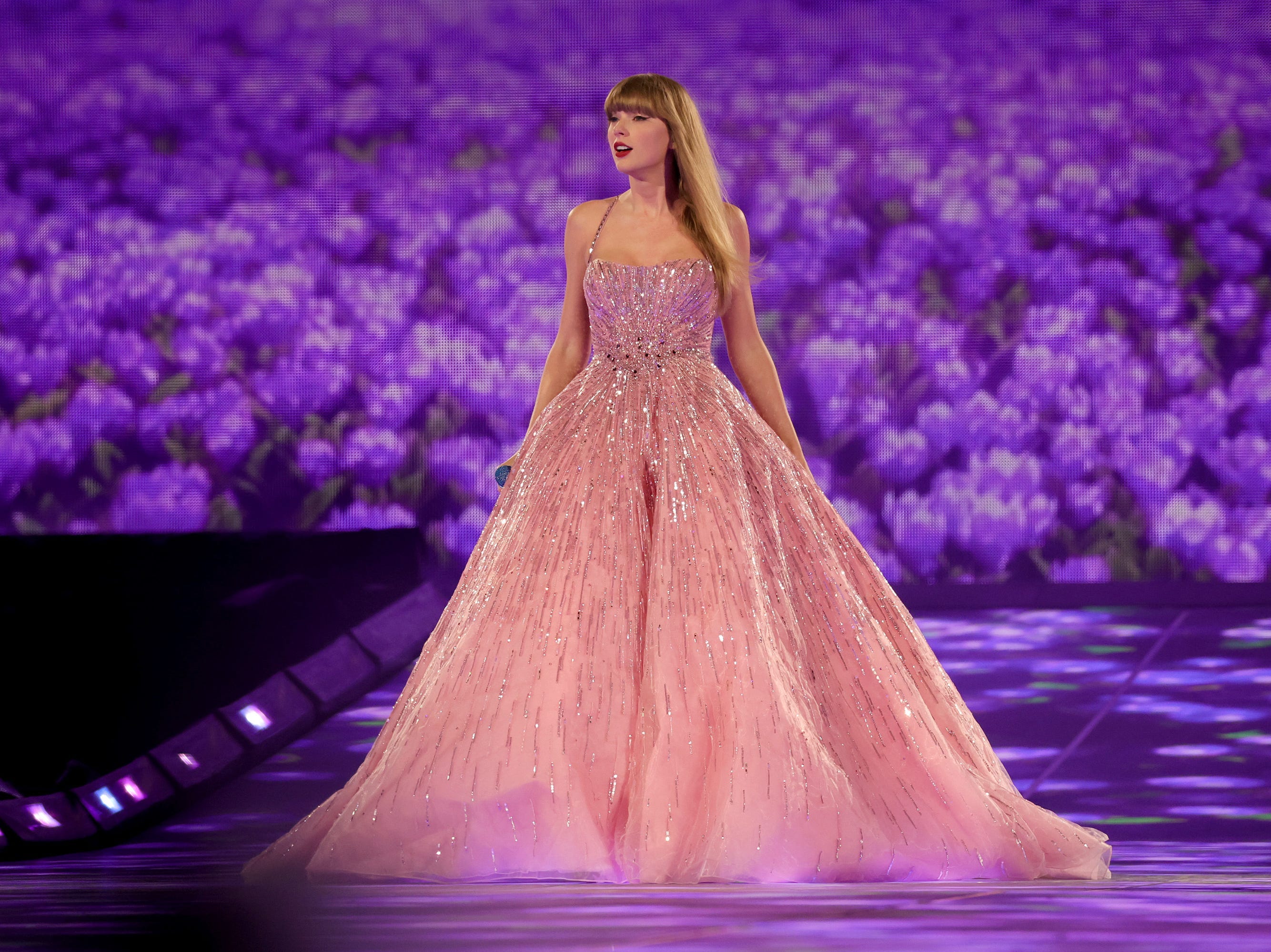 <p>The baby-pink version of the "Enchanted" gown is almost the best, with its flattering neckline and strips of sparkles that resemble falling rain.</p>