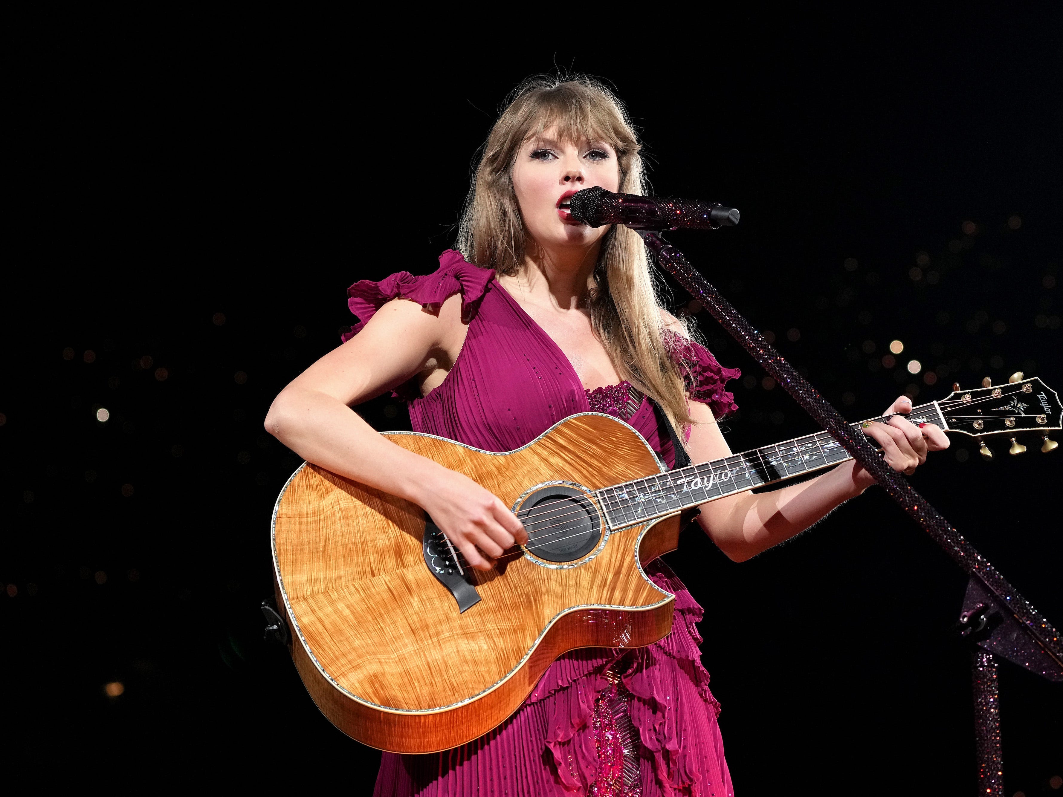 <p>The pink dress still isn't anything to write home about, but Swift looks good in pink.</p>