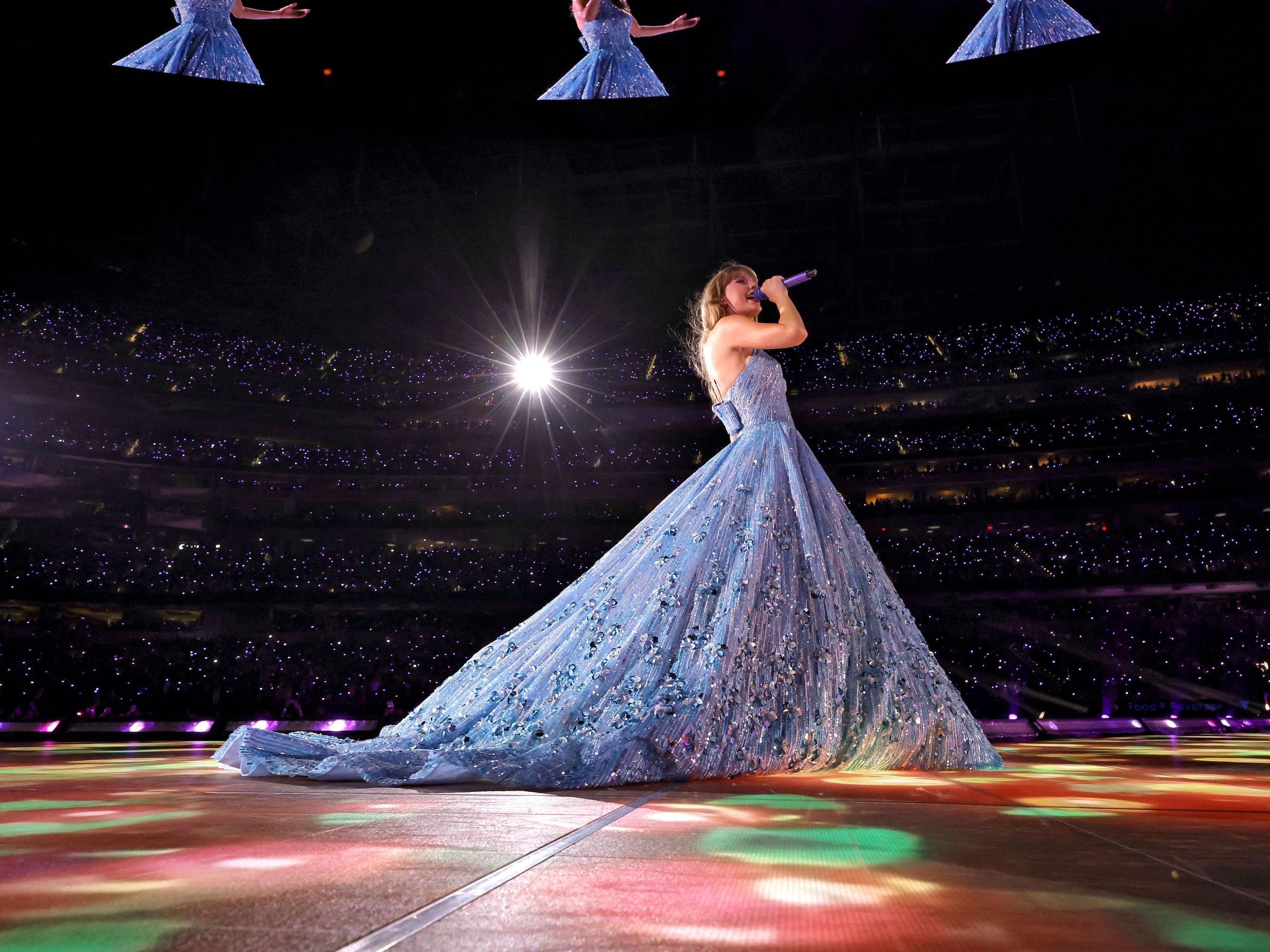 <p>Although blue is not the traditional "Speak Now" color, everything about this dress is truly stunning, from the floral details to the elegant train.</p>