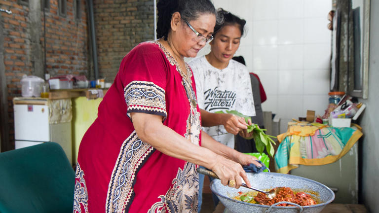 Raised by my Chinese-Indonesian father and Australian mother, learning how to cook Indonesian dishes with the help of Grandma Erneti (left) has helped me understand and celebrate who I am. (Supplied)