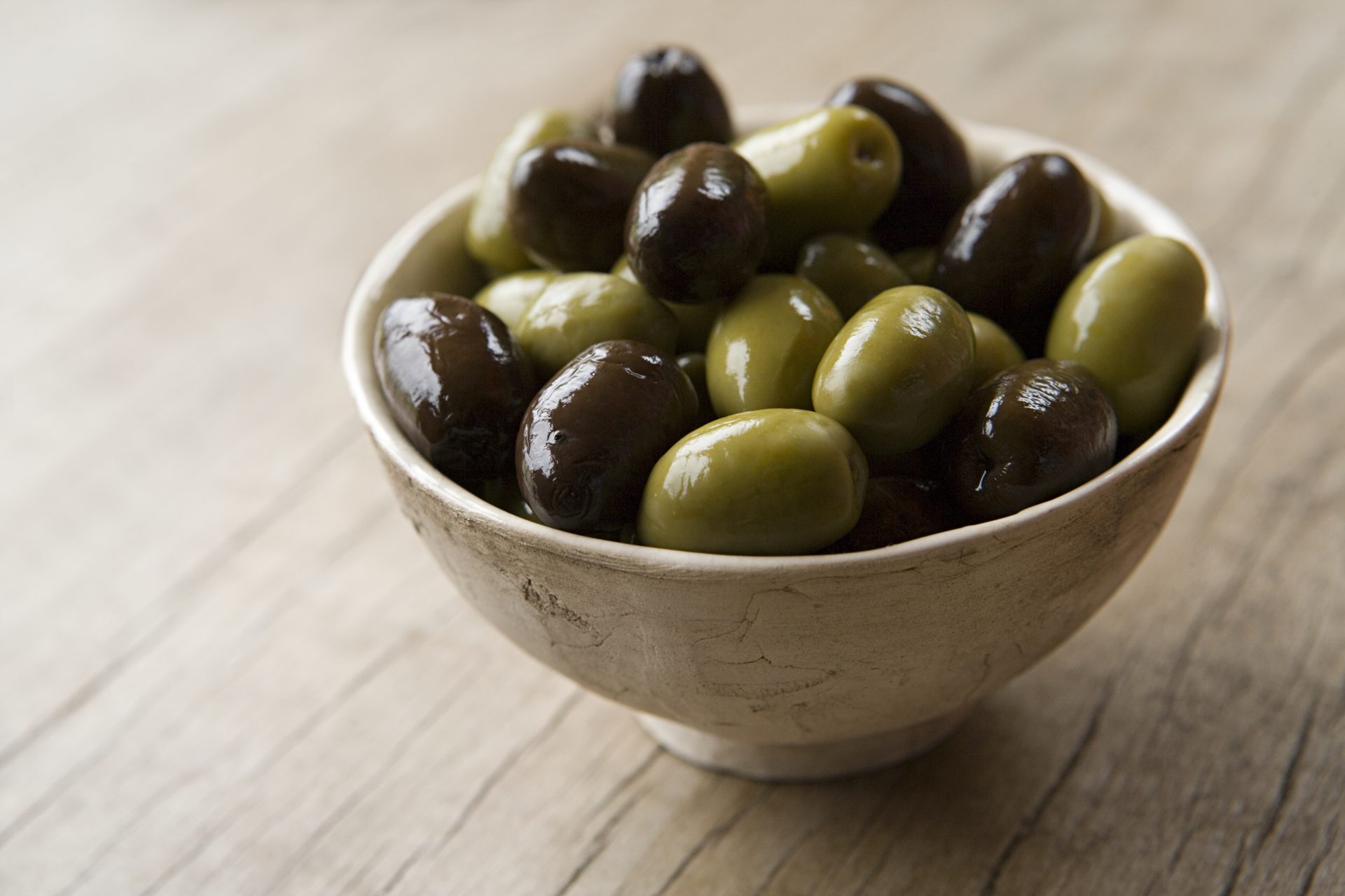 <p>Olives are one of the oldest fermented foods in the Mediterranean area. While some traditionally cured olives are available, many are often pasteurized too. That means they won't all carry the same probiotic punch as seen with other fermented foods. However, they have still been linked to numerous health benefits.</p>