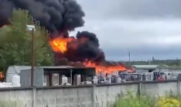 Smoke billows from fire-hit warehouse in Russia