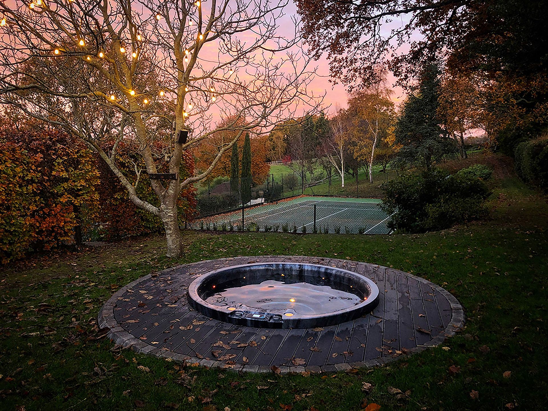 <p>                     The organic, never-ending curve of a circle is a naturally soothing shape. Plus, pick a hot tub in this style and you'll be able to view your surroundings comfortably from all angles.                   </p>                                      <p>                     This stunning (and BISHTA award-winning) example is particularly enticing with its circular surrounding stonework and twinkling lights illuminating the nearby tree.                   </p>