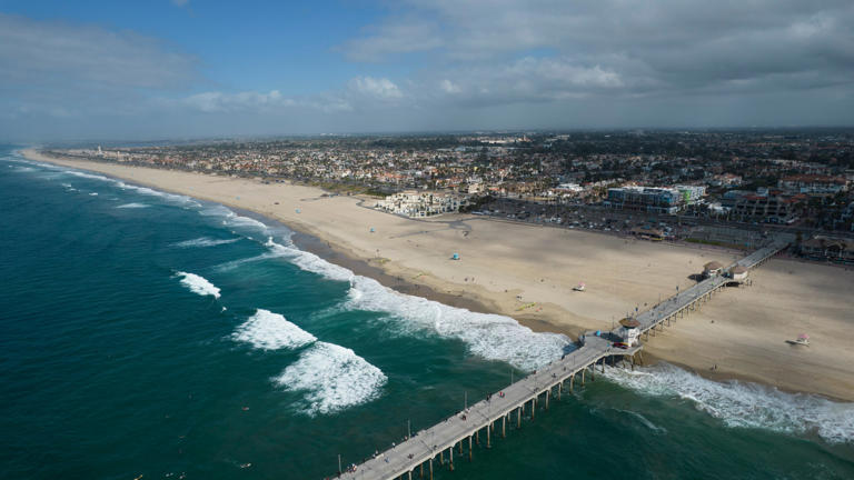 This aerial photo shows the pier and shoreline in Huntington Beach, Calif., on Oct. 11, 2021.