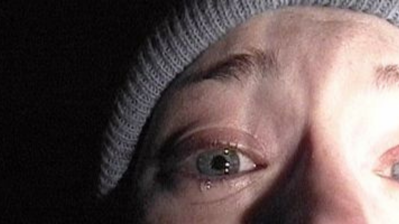 <p>                     When released in 1999, <em>The Blair Witch Project</em> revolutionized the found-footage genre. Near the flick's climax, the surviving filmmaker discovers an unsettling figure, who looks a lot like their friend, standing in the corner of an abandoned house in the woods. The eerie and inexplicable sight effectively capitalizes on the fear of the unknown and isolation, solidifying the film's place as a groundbreaking and unforgettable entry in horror movie history.                   </p>