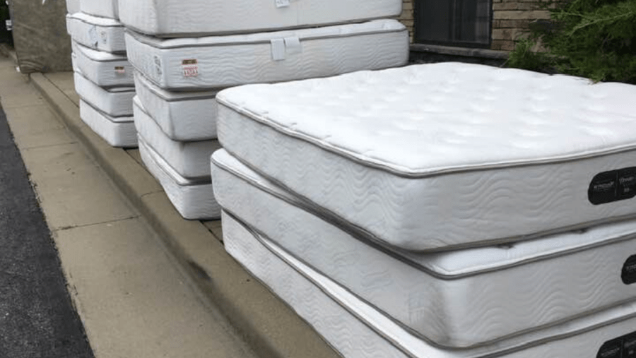 exclusive furniture giving away mattresses