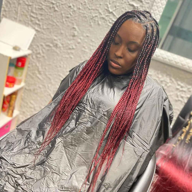 Cool knotless braids with burgundy ends. Photo: @touch_of_excellence22 Source: Instagram