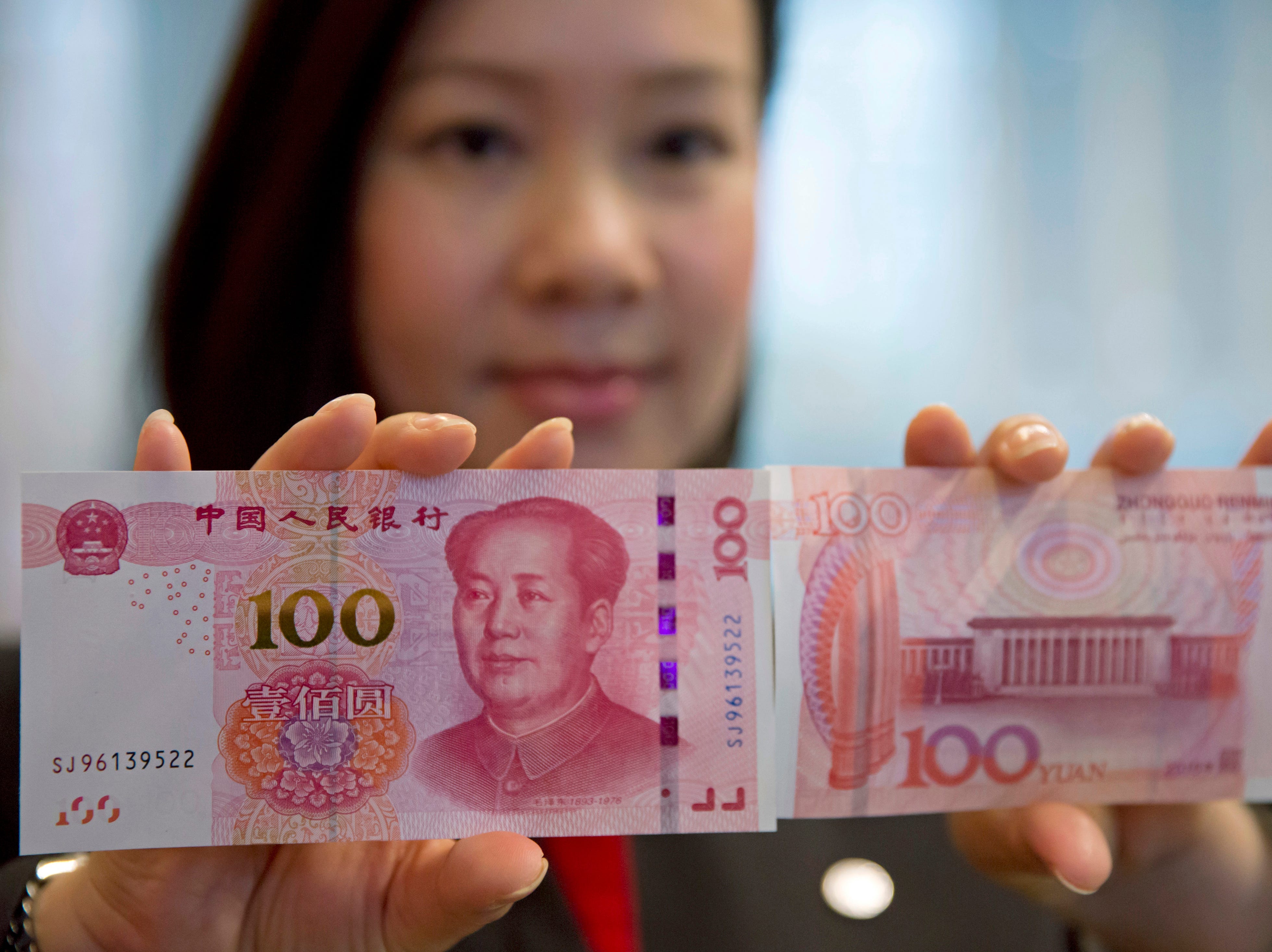 Сколько рублей в юани китайские. 100 Юаней купюра. 100 Китайских юаней. 100 Китайских юаней банкнота. СТО юаней купюра.