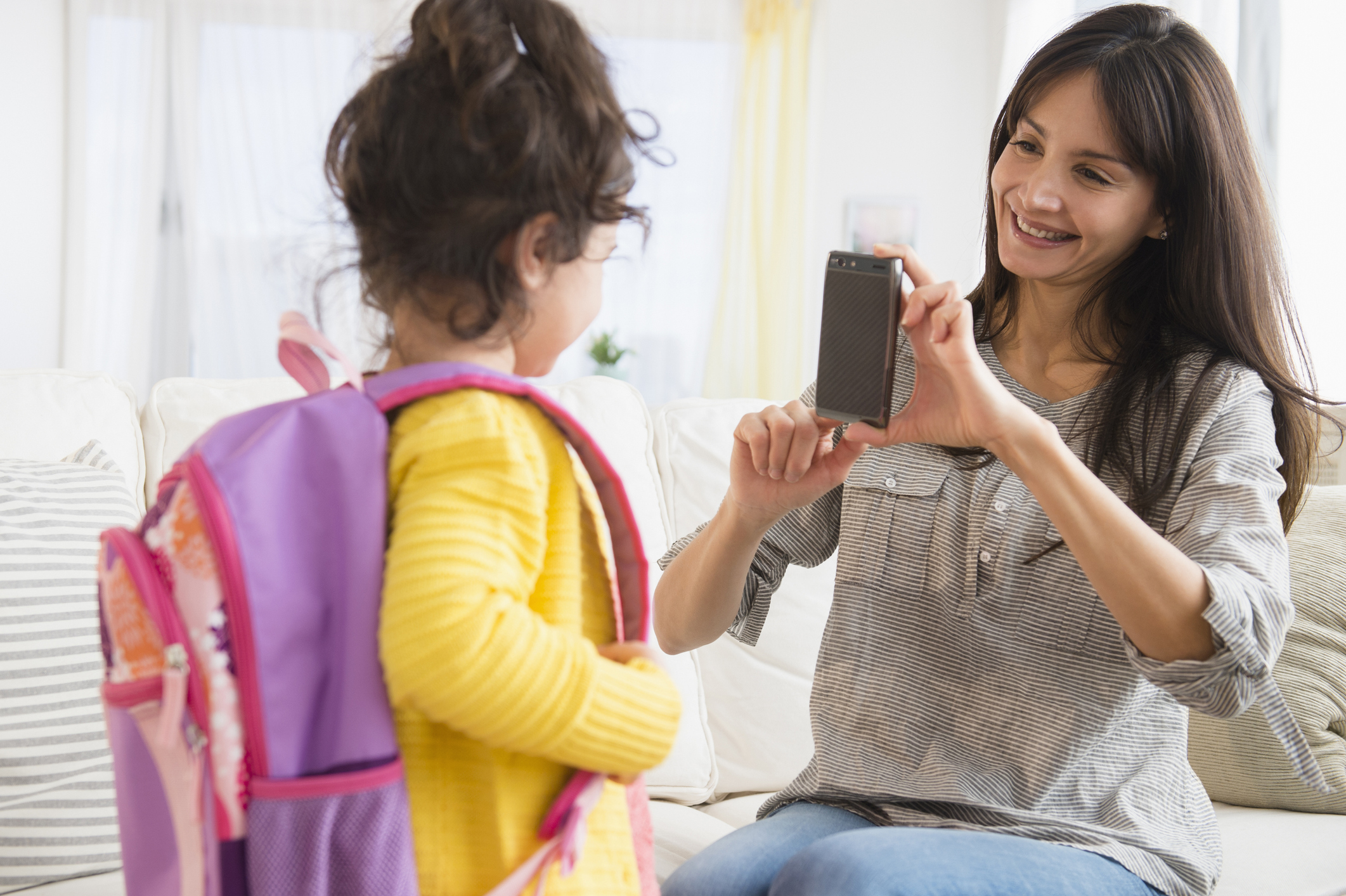 To send a child to school. Mother sending the child to School. A photo of sending your child to School. Shopping Survey. How to get ready for School photo.