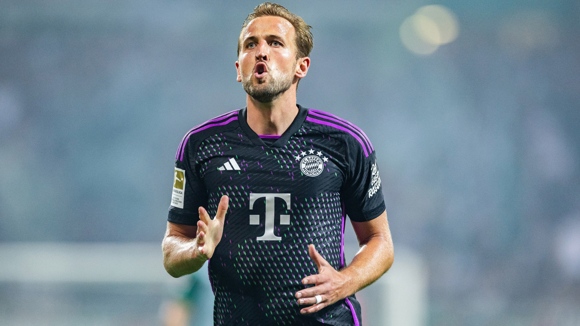  Harry Kane is celebrating a goal while playing for Bayern Munich.
