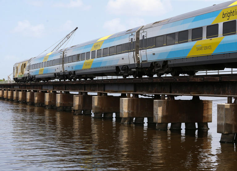 Brightline crosses the St. Lucie River railroad bridge during train testing in the area, Friday, July 21, 2023, in downtown Stuart.