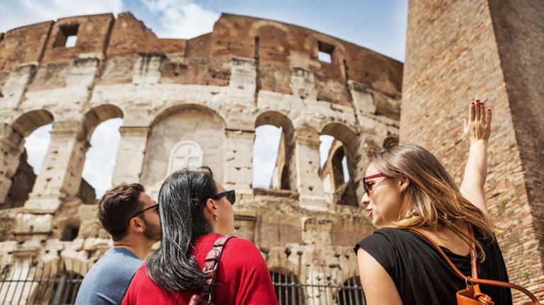 Couple touring Colosseum
