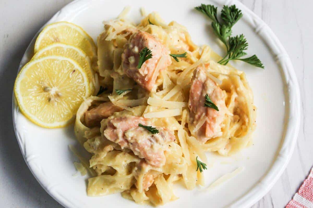 <p>Dive into the decadence of salmon pasta Alfredo—a dish that’s a true treat for seafood lovers. Picture tender salmon pieces nestled in creamy Alfredo sauce. With its elegant flavors and comforting textures, it’s the ultimate comfort food that adds a touch of sophistication to your cravings. Get ready for a seafood feast that’s both indulgent and satisfying.<br><strong>Get the Recipe: </strong><a href="https://littlebitrecipes.com/salmon-alfredo-pasta/?utm_source=msn&utm_medium=page&utm_campaign=msn">Salmon Pasta Alfredo</a></p>