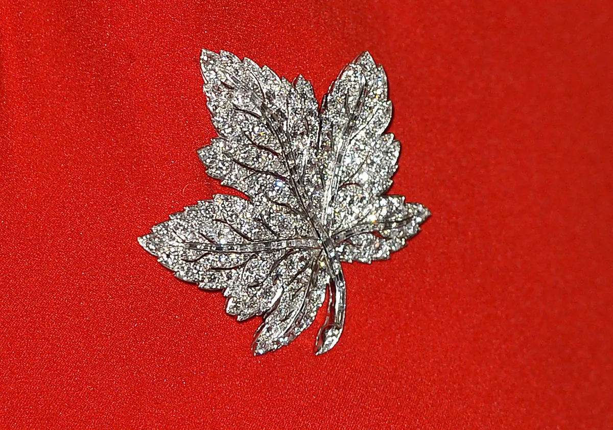 <p>King George VI bought this <a href="https://writeroyalty.com/canadian-maple-leaf-royal-brooch/" rel="noopener noreferrer">Canadian maple leaf brooch</a> for Queen Elizabeth during their first state visit to Canada in 1939. The brooch was bequeathed to Queen Elizabeth II after Queen Elizabeth's passing in 2002. </p> <p>The Canadian maple leaf brooch is one of the most loaned-out pieces of jewelry in the Queen's collection. Camilla and Kate have worn it several times, in addition to Queen Elizabeth II.</p>