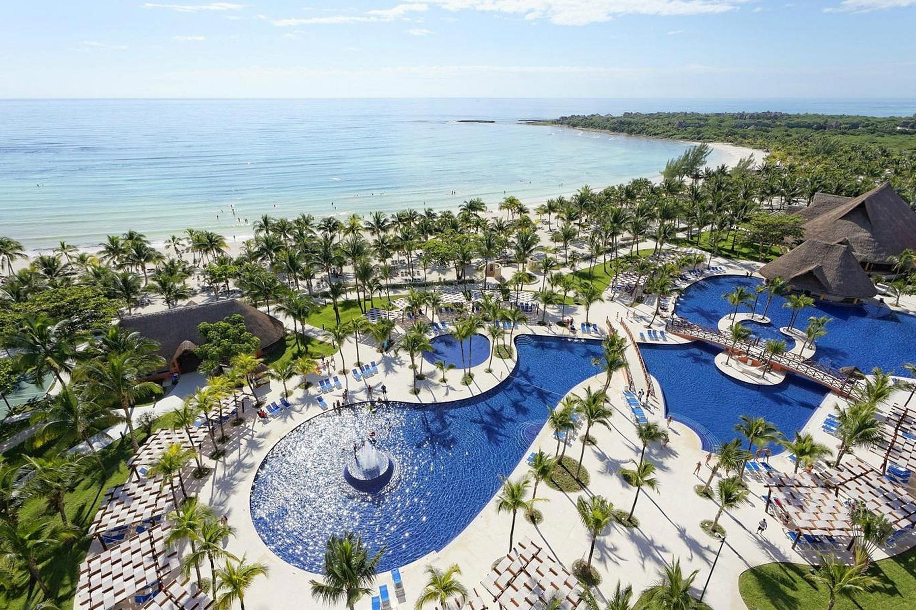 <h3 class=""><strong>Barceló Maya Beach</strong></h3> <p>Part of the Barceló Maya Grand Resort complex, <a href="https://www.tripadvisor.com/Hotel_Review-g153510-d254937-Reviews-Barcelo_Maya_Beach-Puerto_Aventuras_Yucatan_Peninsula.html" rel="noopener noreferrer">Barceló Maya Beach</a> is an <a href="https://www.rd.com/list/affordable-beachfront-hotels/" rel="noopener noreferrer">affordable beachfront hotel</a> located along a 1.25-mile-long stretch of sand in the heart of the Riviera Maya. Those who book the all-inclusive rate can enjoy meals and snacks at three on-site restaurants and drinks at the three on-site bars. Entertainment options abound, and guests also have access to facilities and amenities at the other properties within the complex. This means you'll pretty much never have to fight for a seat by the pool, a personal pet peeve of mine—and one that's all too common in popular beach destinations like Riviera Maya. Guests can also enjoy access to the kid-centric Barcy Water Park (Pirates Island Water Park access is also available, albeit at an extra cost).</p> <p>The true star of the show here, in my opinion, is the sprawling U-Spa Wellness and Fitness Center. While not directly on-property (it's next door at Barceló Maya Beach), it's the perfect place to retreat to should you need a break from the beach—or perhaps even from your own family (speaking from experience here!). The hot stone massage definitely doesn't disappoint, but if that's not your thing, you can take your pick of dozens of other offerings, including facials, body wraps and flotation therapy. Any treatment here is worth booking solely for the sumptuous spa amenities, most notably a restorative hydrotherapy circuit.</p> <p>Other highlights include a kids club, state-of-the-art sports facilities (think: basketball, tennis, mini golf, volleyball, giant chess, pool and ping-pong) and two escape rooms (for an extra charge). Those craving more adventure can take advantage of complimentary non-motorized water sports, like snorkeling, kayaking, windsurfing and taking out a Hobie Wave or water tricycle; however, most require reservations in advance.</p> <p><strong>Pros:</strong></p> <ul> <li class="">Choice between standard and all-inclusive rates, the latter of which is available for as low as $200 per night</li> <li class="">Beautiful beachfront location</li> <li class="">Access to services and facilities found throughout the Barceló Maya Grand Resort complex</li> </ul> <p><strong>Con</strong><strong>:</strong></p> <ul> <li class="">The resort has been only partially remodeled, so while all the rooms are comfortable, some are dated</li> </ul> <p class="listicle-page__cta-button-shop"><a class="shop-btn" href="https://www.tripadvisor.com/Hotel_Review-g153510-d254937-Reviews-Barcelo_Maya_Beach-Puerto_Aventuras_Yucatan_Peninsula.html">Book Now</a></p>