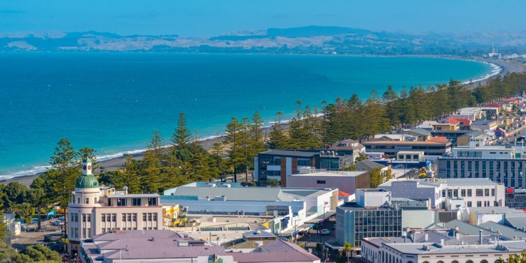 <p>Napier is located on the east coast of the North Island in the sunny Hawkes Bay region. This coastal city is an excellent place to visit on the North Island if you love wine, good food, and Art Deco architecture.</p><p>After experiencing a devastating earthquake in 1931, the city of Napier was rebuilt in the Art Deco fashion of the time. This means that Napier is now one of the best places in the world to experience Art Deco architecture. There are options for <a href="https://viator.tp.st/40VcYJKl" rel="noreferrer noopener nofollow sponsored">Art Deco walking tours</a>, or you can pick up a pamphlet at the Napier Visitor Center to do a self-guided tour.</p><p>Napier is also surrounded by one of the best wine regions in New Zealand. The Hawkes Bay wine region is New Zealand’s second-largest wine region, with over 200 vineyards. The region is known for its Chardonnay, Syrah, and Merlot Cabernet blends.</p><p><a href="https://viator.tp.st/j2g9APoB" rel="noreferrer noopener nofollow sponsored">Book a wine tour</a> to experience some of the region’s best wineries, or <a href="https://viator.tp.st/Ws2HOxH8" rel="noreferrer noopener nofollow sponsored">rent bikes</a> to cycle to wineries along Hawkes Bay’s fantastic network of cycle trails.</p>