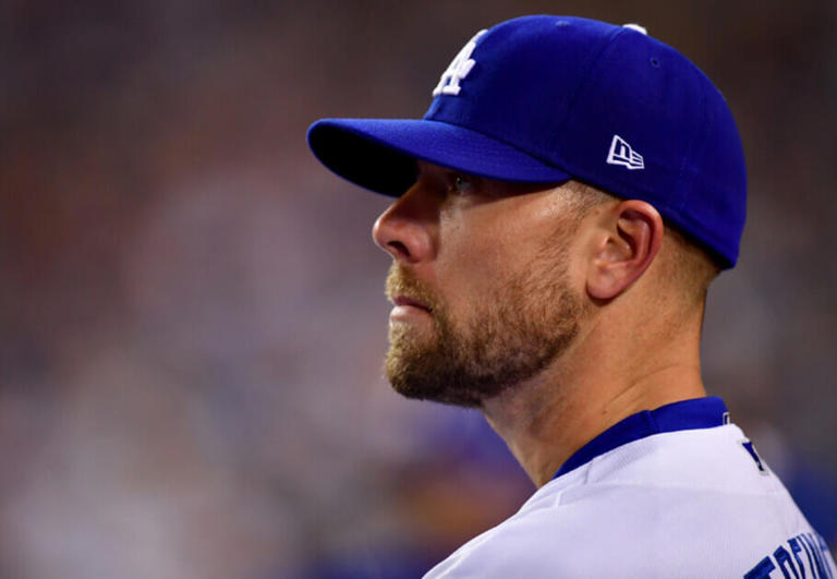 Oct 12, 2022; Los Angeles, California, USA; Los Angeles Dodgers relief pitcher Blake Treinen (49) watches during the bottom of the eighth inning of game two of the NLDS for the 2022 MLB Playoffs against the San Diego Padres at Dodger Stadium. Mandatory Credit: Gary A. Vasquez-USA TODAY Sports
