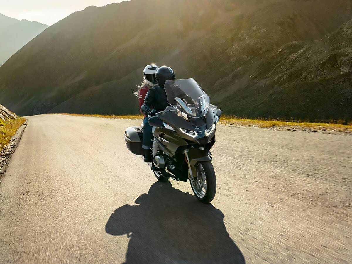 <p>The BMW R1250 RT is a touring bike with a 1254 cc dual-cylinder ShiftCam boxer engine that produces 105 lb-ft of torque at 6,250 rpm. The bike features adaptive headlights, a new Active Cruise Control, heated seats, a keyless ride, a 10.25" TFT dashboard with navigation and connectivity, and a standard storage capacity of 18.4 gallons.</p> <p>The R1250 RT can fetch you a great price on resale if it has factory-installed side panniers and fairing. However, it still maintains a high resale value (up to 93%) on its original price of $19,995, even without the accessories. </p>