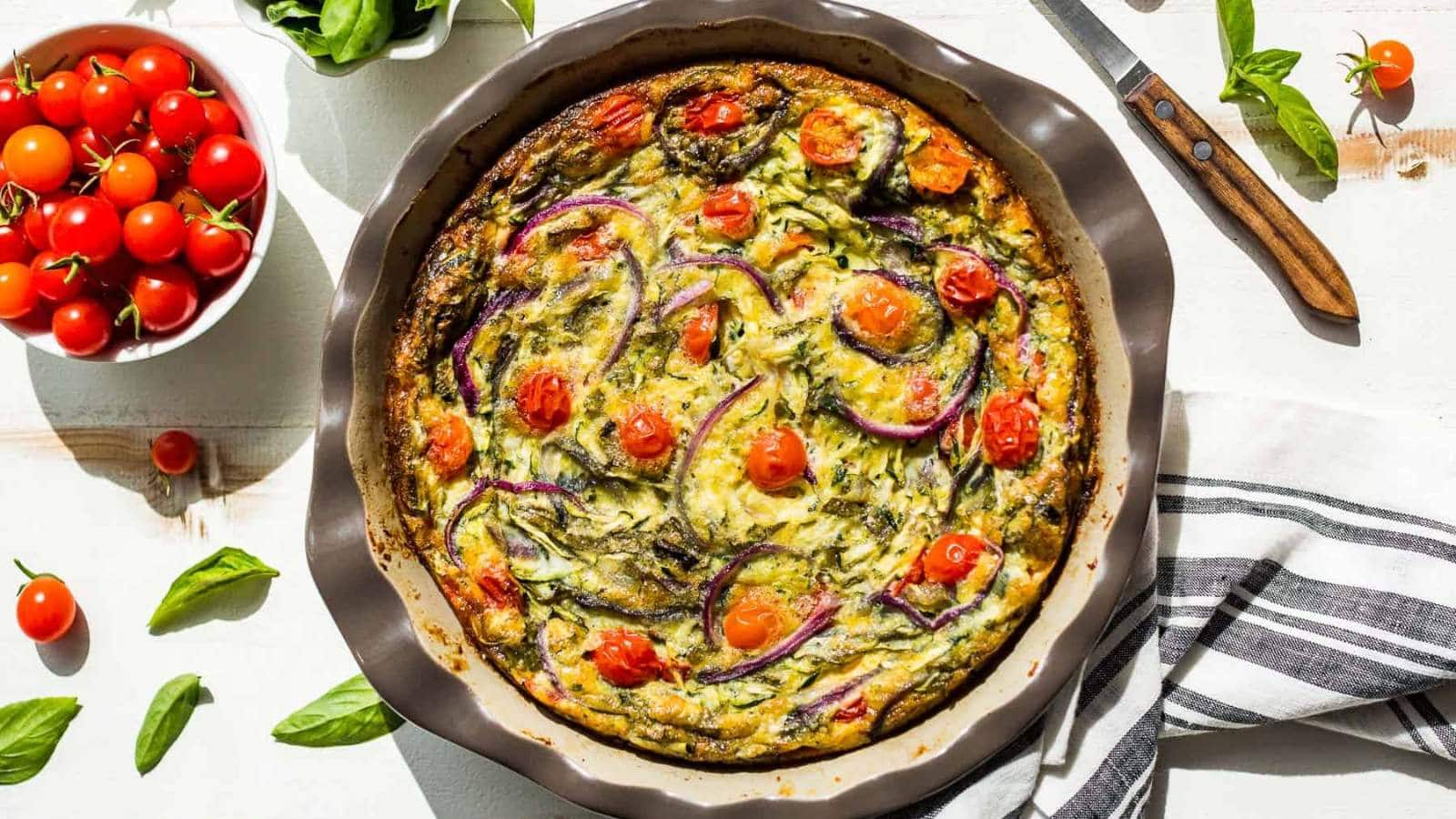 <p>Bursting with flavor, this Vegetarian Breakfast Casserole is easy to make for breakfast that’s also great for meal prepping. Packed with veggies and protein, this casserole is like a crustless quiche. Enjoy the combination of zucchini, onion, tomatoes, and basil with 2 kinds of optional cheeses to add in as well.</p><p><strong>Get the Recipe: <a href="https://getinspiredeveryday.com/food/easy-veggie-breakfast-bake/" rel="noreferrer noopener">Vegetarian Breakfast Casserole</a></strong></p>