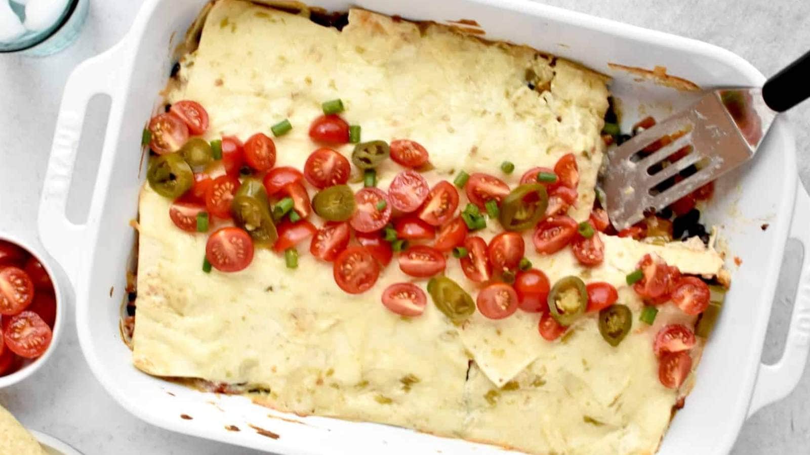 <p>This Sour Cream Chicken Enchilada Casserole is a great weeknight recipe that is sure to become a family favorite. A perfect use for leftover chicken, this is a delicious and simple dinner that will delight your taste buds.</p><p><strong>Get the Recipe: <a href="https://lovefromthetable.com/sour-cream-chicken-enchilada-casserole/" rel="noreferrer noopener">Sour Cream Chicken Enchilada Casserole</a></strong></p>