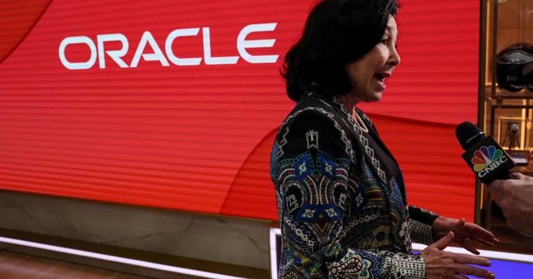 Oracle shares surge almost 12% and close at a record