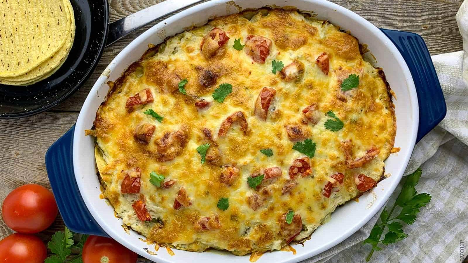 <p>Salsa Verde Chicken Tortilla Casserole is a creamy, cozy, comforting baked chicken dish bursting with Tex-Mex flavors! Layers of creamy, spicy chicken alternated with corn tortillas, fresh tomatoes, and lots of cheese make this a delicious chicken dish your whole family will love.</p><p><strong>Get the Recipe: <a href="https://www.flavourandsavour.com/salsa-verde-chicken-tortilla-casserole/" rel="noreferrer noopener">Salsa Verde Chicken Tortilla Casserole</a></strong></p>