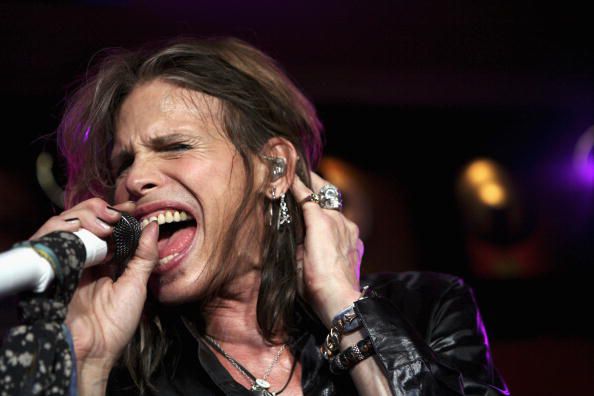 LONDON - FEBRUARY 19: Aerosmith frontman Steven Tyler performs on stage at an exclusive gig to promote 'Hyde Park Calling' at The Hard Rock Cafe on February 19, 2007 in London, England. The event, presented by Hard Rock, is set to take place on June 23 and 24 this year and the band will headline on the second of the two days at their first UK concert date in 8 years. (Photo by Claire Greenway/Getty Images)