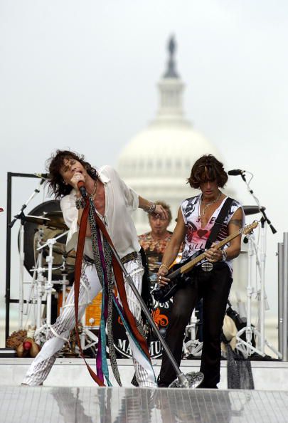 WASHINGTON - SEPTEMBER 4: Aerosmith singer Steven Tyler and guitarist Joe Perry rehearse for the 2003 