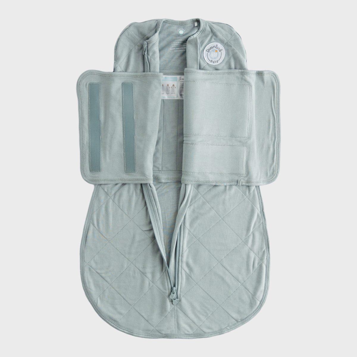 <p>Babies love being swaddled, but not every parent masters the art of wrapping a baby like those seasoned nurses on the maternity floor. So when you're on your own at home, this <a href="https://dreamlandbabyco.com/products/bamboo-classic-swaddle-0-6-months-non-weighted" rel="noopener noreferrer">popular swaddle</a> is the next best thing as one of the best baby gifts to give. Made from viscose from bamboo, this non-weighted option has a convenient built-in swaddle band and a two-way zipper that makes diaper changes a breeze.</p> <p>And as a baby's sleep needs change, so does this swaddle. There are three ways to wear it: both arms in, one arm in, and both arms out. This means it ultimately goes from swaddle to sleep sack so they'll feel like they're wrapped in a <a href="https://www.rd.com/list/best-throw-blankets/">cozy blanket</a> all night.</p> <p class="listicle-page__cta-button-shop"><a class="shop-btn" href="https://dreamlandbabyco.com/products/bamboo-classic-swaddle-0-6-months-non-weighted">Shop Now</a></p>