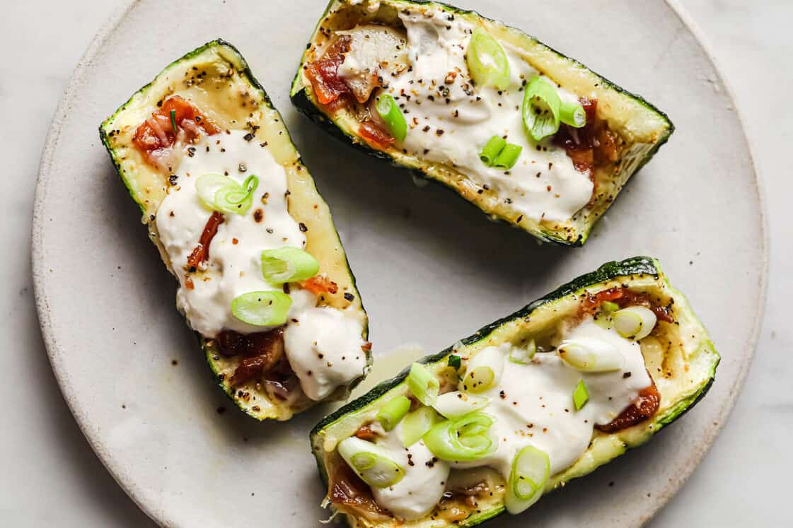 <p>These zucchini boats are a playful twist on loaded potato skins and can be prepared in under an hour. Ideal for appetizers or a light main course, they’re a hit at any gathering. The quick bake time and simple ingredient list make this a practical recipe. A straightforward preparation process leads to an easy and light meal. You can enjoy a flavorful dish without spending much time in the kitchen.<br><strong>Get the Recipe: </strong><a href="https://realbalanced.com/recipe/loaded-zucchini-skins/?utm_source=msn&utm_medium=page&utm_campaign=msn">Loaded Zucchini Boats</a></p>