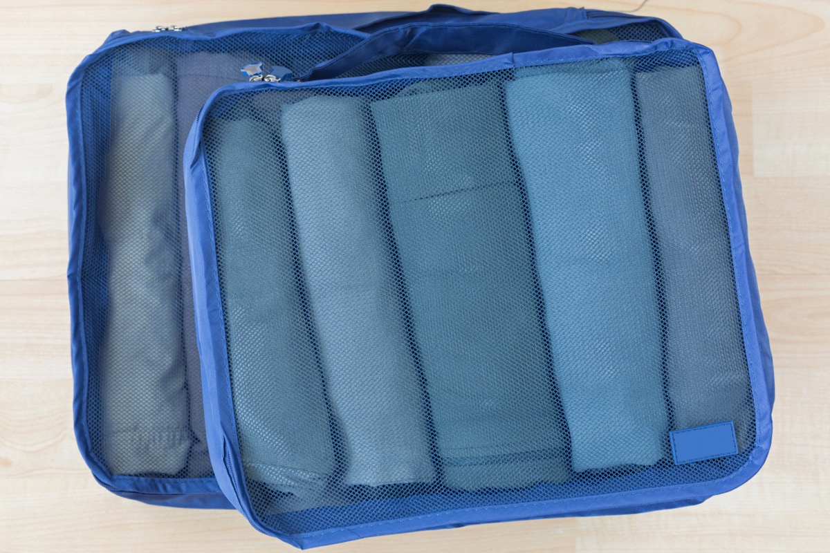 <p>One of the best organizing and space-saving techniques is to use packing cubes.</p><p>"If you are on a tour and moving from hotel to hotel daily, it is key to have your items packed in cubes so you're not looking for socks while mulling through sweaters, shirts, and underwear," Parizek says.</p>