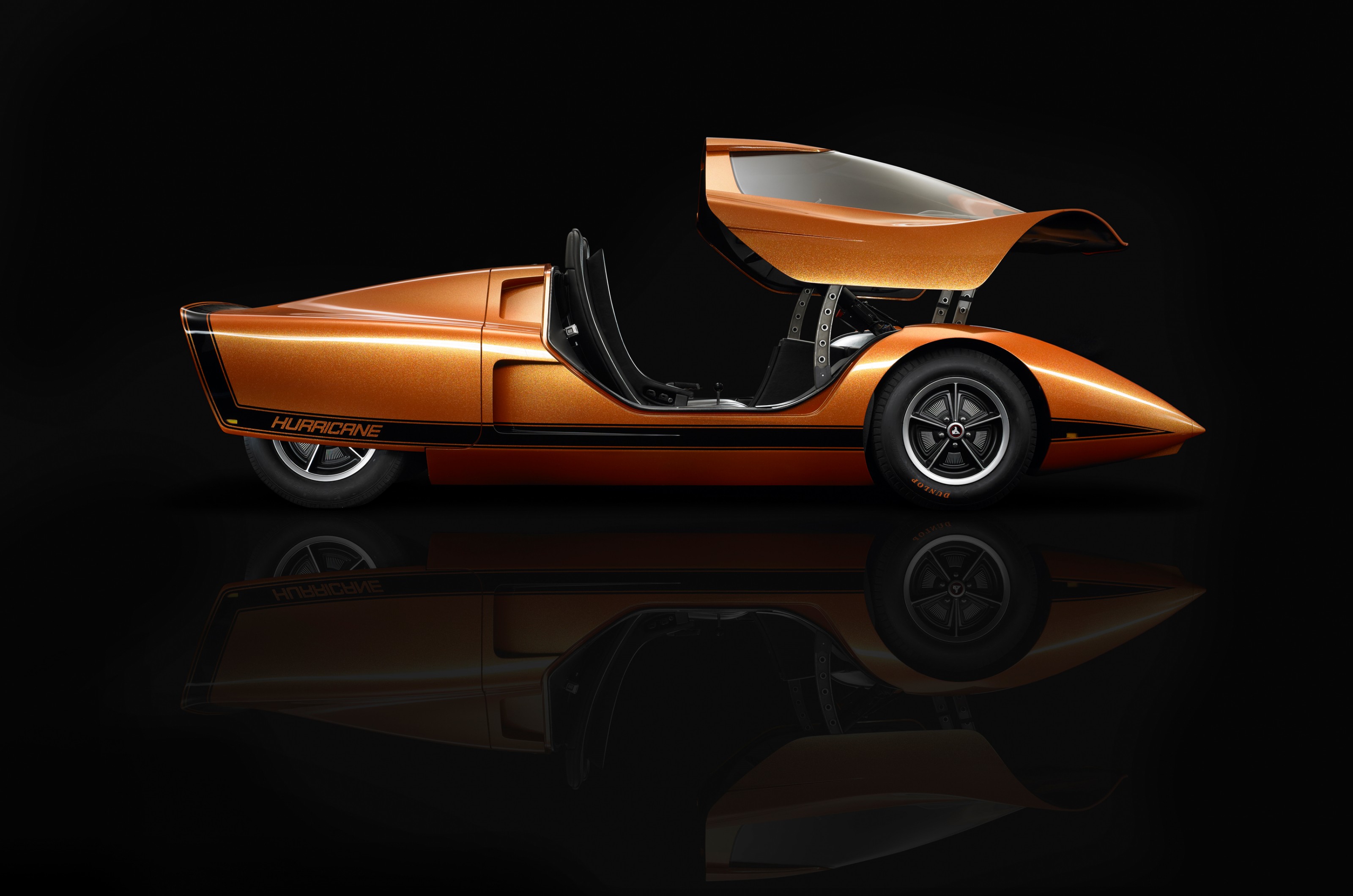 <p>In overcoming the incredibly low stance of the Holden Hurricane, its designers weren’t content with the idea of occupants awkwardly rising to their feet to hop out of the sports car.</p>  <p>As the hydraulically powered clamshell canopy opened, the seats simultaneously lifted slightly and titled forwards like a motorized armchair.</p>  <p>This strange opening allowed for an uninterrupted view out of the front thanks to a pillarless Plexiglass windshield.</p>  <p>Rearward vision was non-existent so the Hurricane has a rear-mounted camera, something that’s still seen as a luxury on modern cars today.</p>  <p>It was clear this car was never intended for series production, but for the late ’60s this was a revolutionary concept that gave a glimpse into the future.</p>