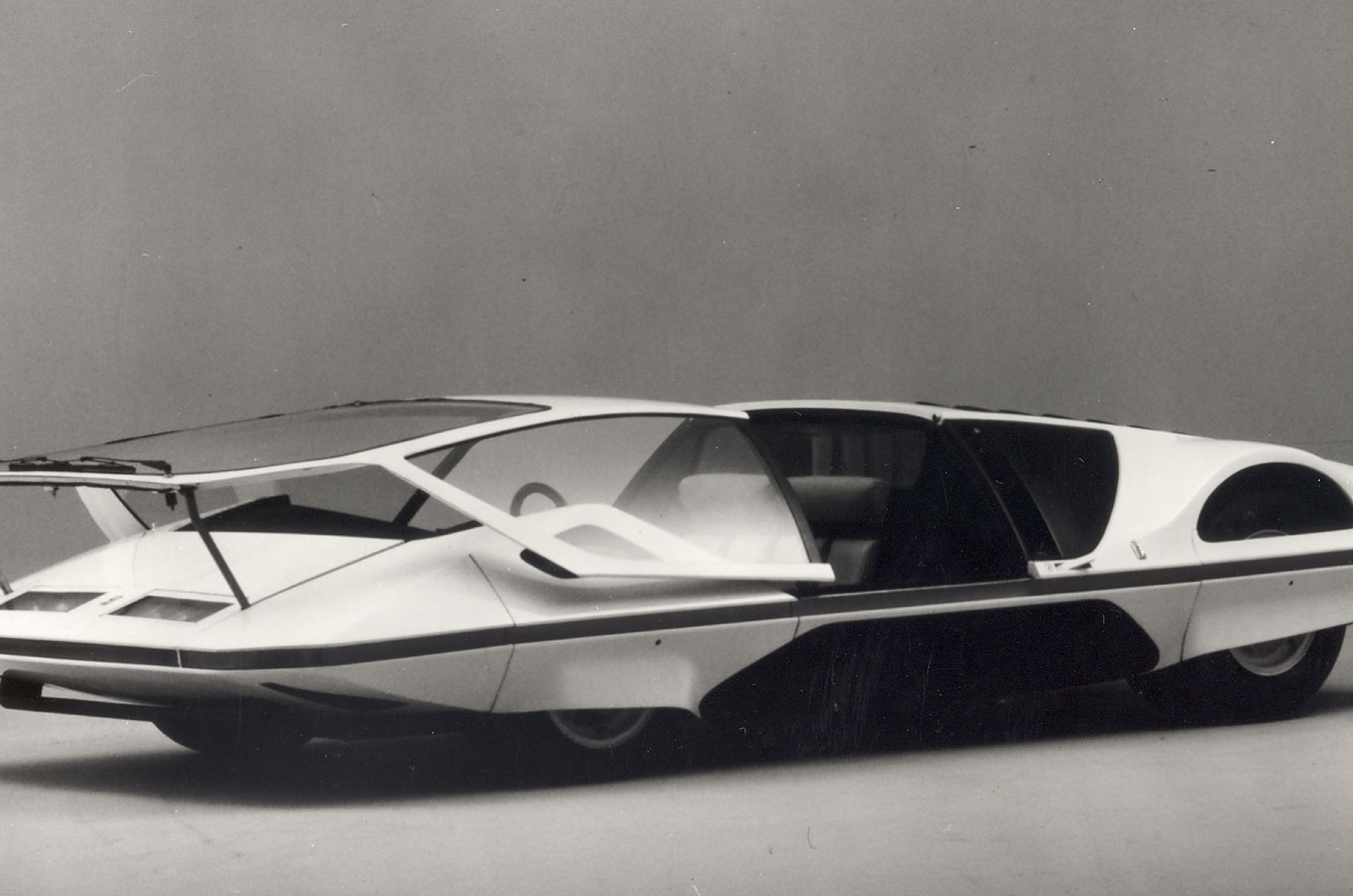 <p>Pininfarina’s take on the wedge design needed an innovative solution to access the vehicle without disrupting its stark lines. Instead of constructing gullwings or butterfly doors, the obvious decision was to create an entire cockpit cover that slid forward on two supports.</p>  <p>As a mid-engined supercar concept, there was enough room in the front to accommodate this contraption and no risk of excess heat warping the panels.</p>  <p>But there wasn’t any risk of this anyway, because its c550HP 5-liter V12 engine never ran – that is, until recently.</p>  <p>The American movie producer James Glickenhaus bought the concept car in 2014, and had it restored and put on the road.</p>  <p>Although he had a small fire when driving it in 2019, it has, apparently, been fixed and is back to its former glory.</p>