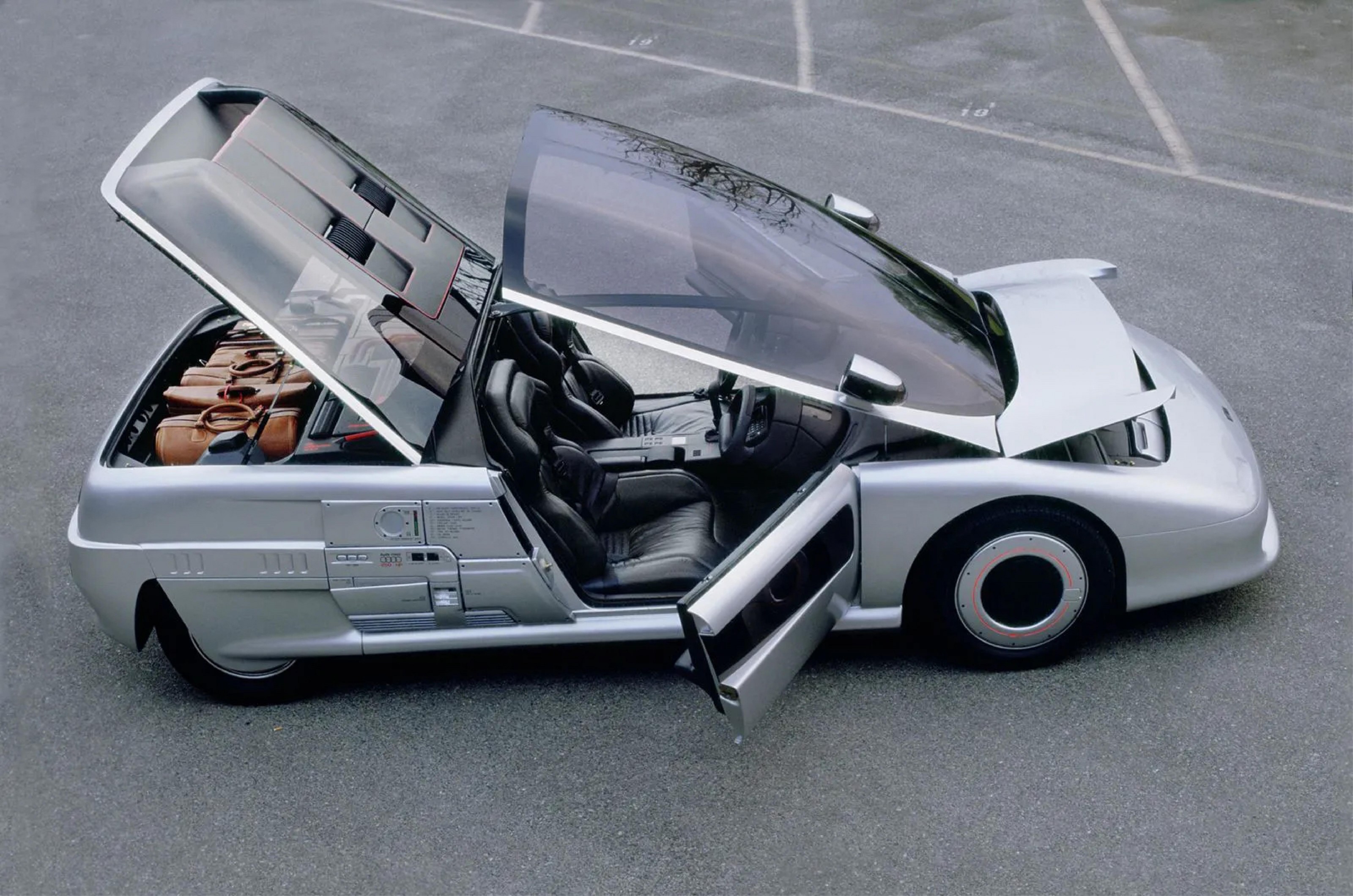 <p>Later we’ll see Lancia’s reimagining of the windshield, but the Italdesign Aspid takes it a step further to include the side windows and sunroof.</p>  <p>Although it’s one of the few cars on our list with conventional doors, these are entirely useless without the curved glass roof.</p>  <p>Italdesign says: “The starting point for the Aspid project was the possibility of molding windows with double curvature (made out of glass that was not cylindrical in cross-sections but spherical) on an industrial basis. The new technique meant that the designers could incorporate the glazed surfaces into the flowing overall lines of the car’s shape without having to introduce discontinuities.”</p>  <p>However, there is a central seam where the two passenger compartments are joined together.</p>