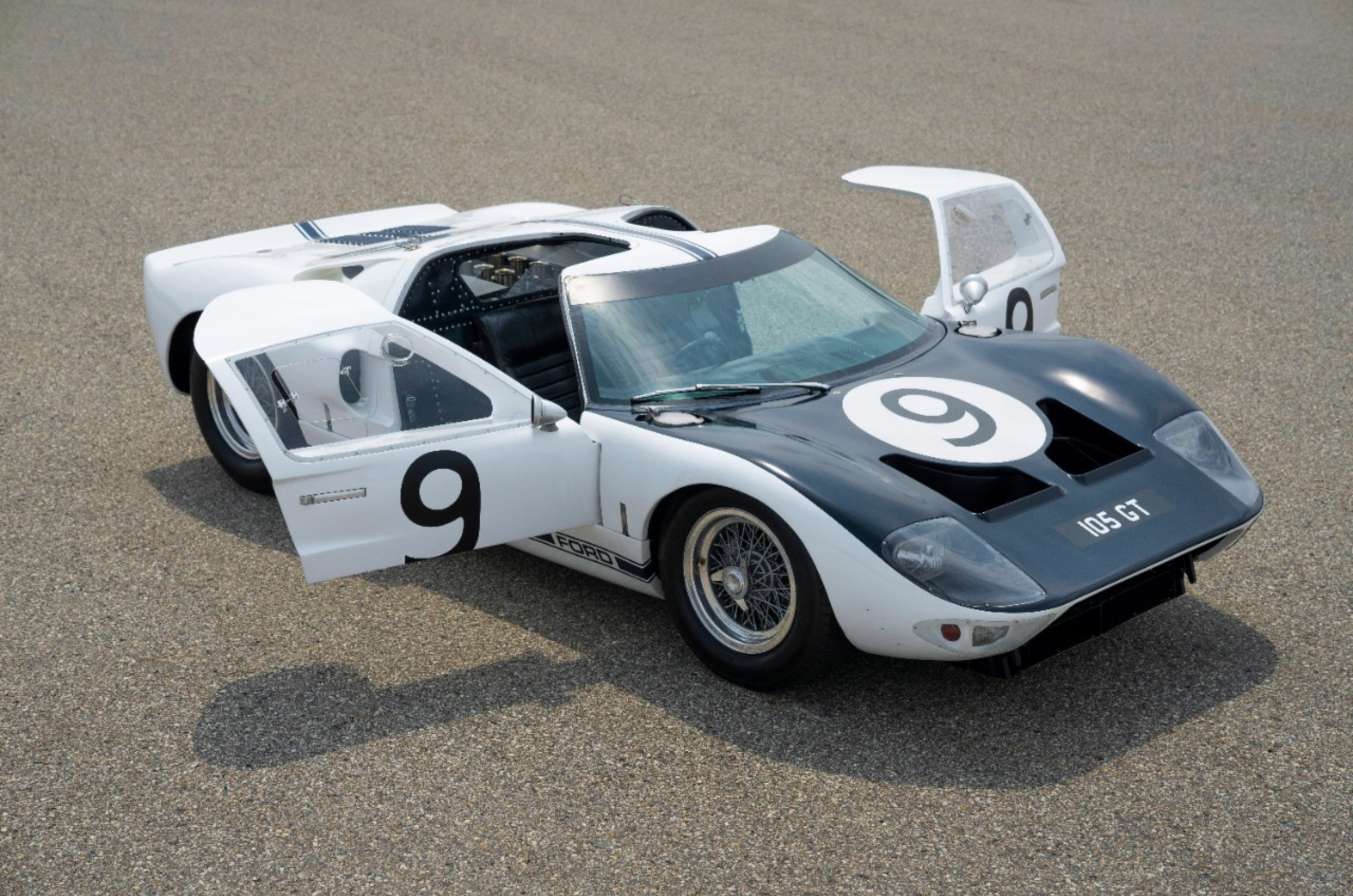 <p>Although the Ford GT40 has close-to-conventional side-hinged doors, the extra roof cutout makes all the difference.</p>  <p>Designed as a racer through and through, the GT40’s door outline was purely functional: it made it easier to get in and out of the car with a helmet on.</p>  <p>In such a low car, entry and exit can be a challenge at the best of times, but with a helmet on and wanting to do it as fast as possible mid-race called for inventive thinking.</p>