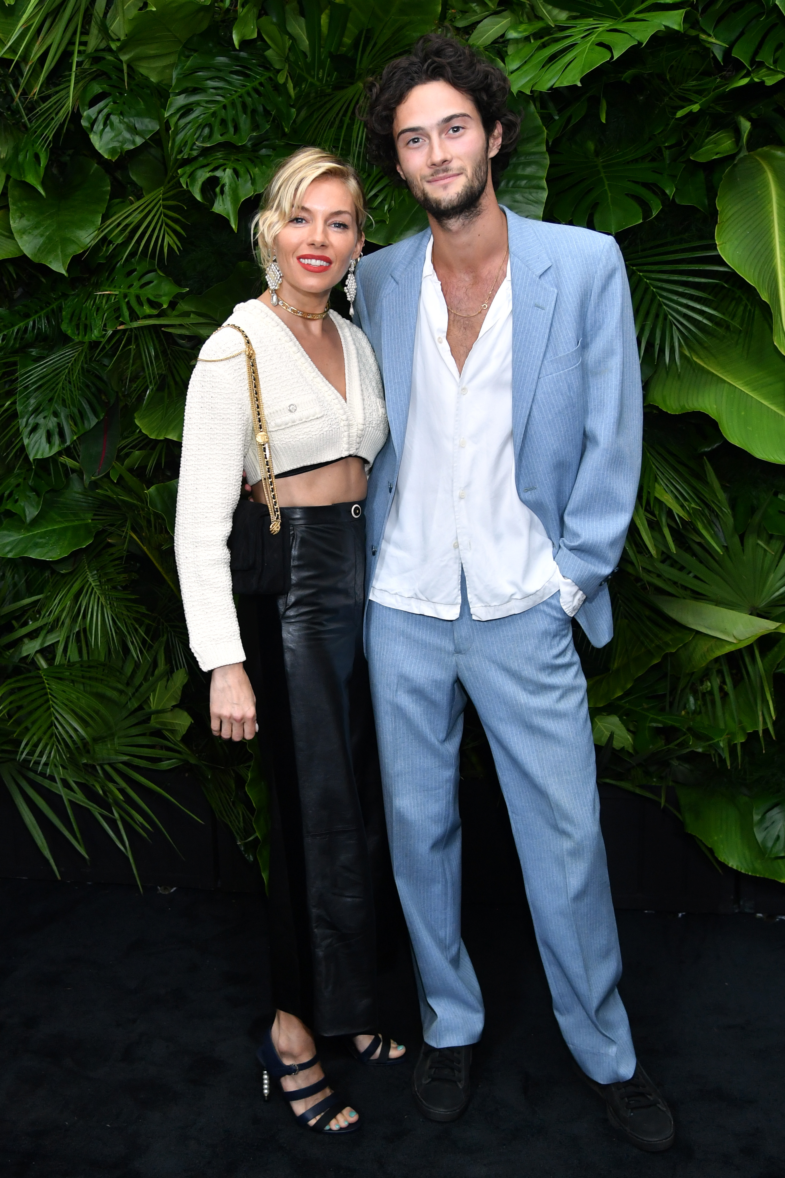 <p>In February 2022, "American Sniper" actress Sienna Miller, then 40, stepped out <a href="https://www.wonderwall.com/celebrity/couples/tk-plus-more-celeb-love-news-554241.gallery?photoId=554815">on a date night</a> in New York City with Oli Green — a model and actor 15 years her junior. In August 2023, the British beauty -- whose romance with Oli has continued -- revealed that she's pregnant with her second child, <a href="https://people.com/sienna-miller-is-pregnant-expecting-second-baby-photos-exclusive-7563810">People</a> magazine confirmed. (Sienna is already a mom to a daughter with actor ex Tom Sturridge.)</p><p>Oli -- who's worked as a model for Gap and Burberry and appeared on "The Bold and the Beautiful" and on the Apple TV+ series "The Mosquito Coast" -- isn't the first younger man Sienna has dated. In 2020, she was <a href="https://www.wonderwall.com/celebrity/couples/lady-gaga-new-boyfriend-revealed-dating-celeb-love-life-news-early-february-2020-hollywood-romance-report-3022181.gallery?photoId=1071624">rumored to be engaged</a> to book editor Lucas Zwirner, who's about a decade younger than her.</p>