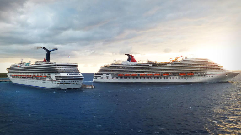 Two Carnival Cruise Line ships at seas. Lead JS