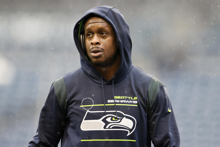 SEATTLE, WASHINGTON - JANUARY 02: Geno Smith #7 of the Seattle Seahawks looks on before the game against the Detroit Lions at Lumen Field on January 02, 2022 in Seattle, Washington. (Photo by Steph Chambers/Getty Images) Steph Chambers/Getty Images
