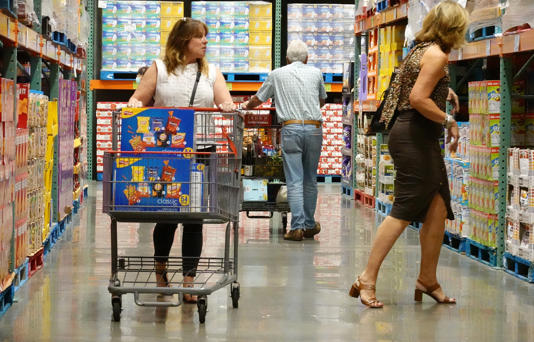 In this picture: Customers shop at a Costco store on August 31, 2023 in Novato, California. According to a report by the Commerce Department, consumer spending rose 0.8% in July beating expectations of 0.7%.