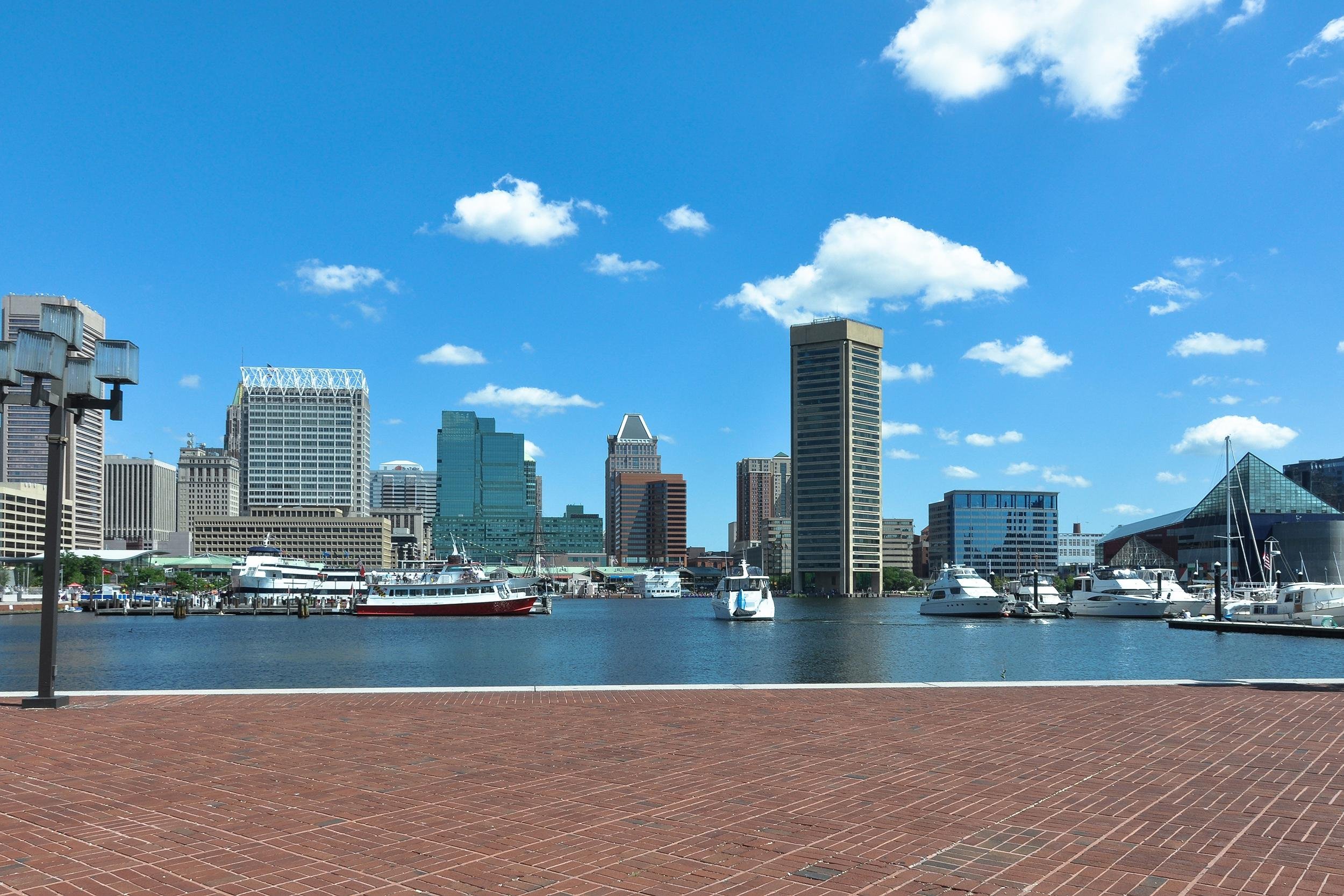 <p>The Inner Harbor is a scenic tourist destination. In spring and summer, the juxtaposition of high-rise buildings with boats on the water makes for a great photo, even without your smiling face in the center. This is one instance where you might want to break out a selfie stick to get as much of the city and harbor in the photo as possible.  </p>