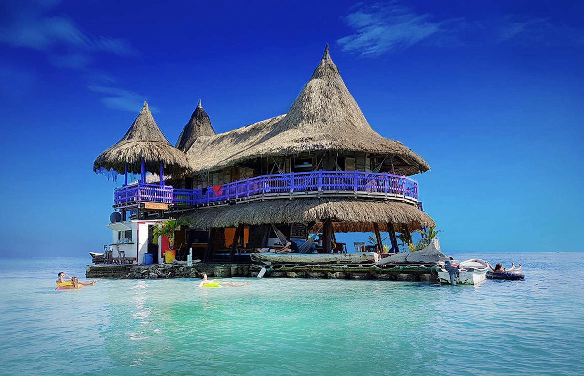 <p>Floating hotels aren't just the preserve of the wealthy, and they don't have to be 5-star luxury properties either. In Colombia, <a href="https://casaenelagua.com">Casa en el Agua</a>, or 'House on the Water', is a hostel with a difference. Set in the San Bernardo Corals National Park in Colombia, this modest little hostel enjoys a prime location atop the turquoise Caribbean Sea.</p>