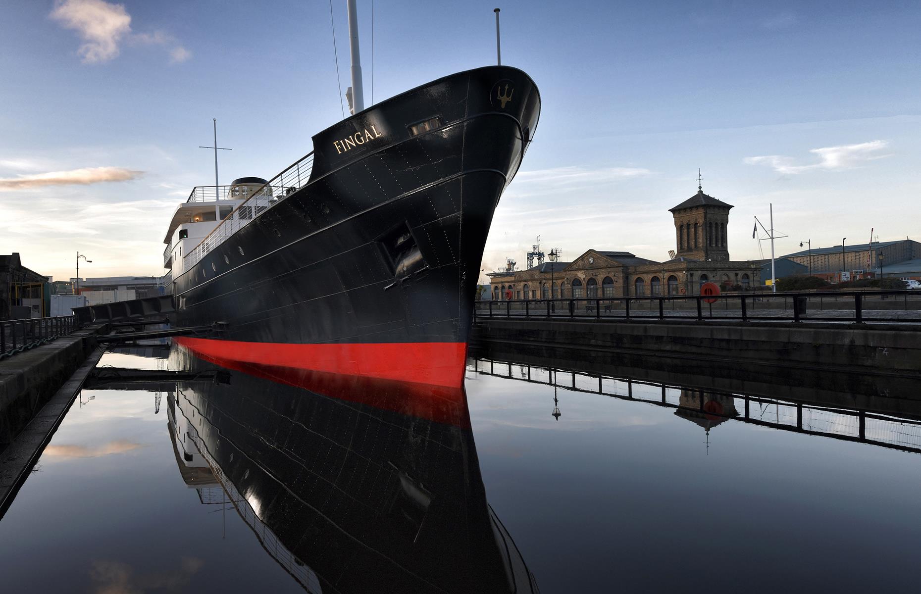 <p>Opened in January 2019, this handsome ship is in fact <a href="https://www.fingal.co.uk">a beautiful 23-room floating hotel</a>, permanently docked in historic Leith in Edinburgh. Once a Northern Lighthouse Board ship, it was revamped by the team at The Royal Yacht Britannia and now offers guests a seriously luxurious stay, with various types of cabin available and a deck with glorious views out to the Scottish capital. </p>