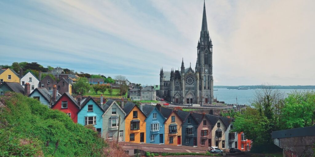 <p>Cobh is best known for being the final stop the Titanic made before its fated journey across the Atlantic. It’s also home to St. Colman’s Cathedral, a stunning cathedral that overlooks the harbor. You can also visit “The Deck of Cards,” a collection of colorful houses stacked against each other. As the name suggests, it is reminiscent of a deck of cards. </p><p>There are also several adorable restaurants, pubs, and cafes in town. The Seasalt Cafe is one of the most popular spots in town, and you can stop by for breakfast or lunch while you’re in Cobh. </p><p>After you’ve explored Cobh, you can take a short ferry ride to Spike Island. It is a former prison complex that housed many Irish revolutionaries and other prisoners over the course of its storied history. A tour takes you around the grounds, offering a glimpse into the experiences of Irish prisoners over the decades. </p>