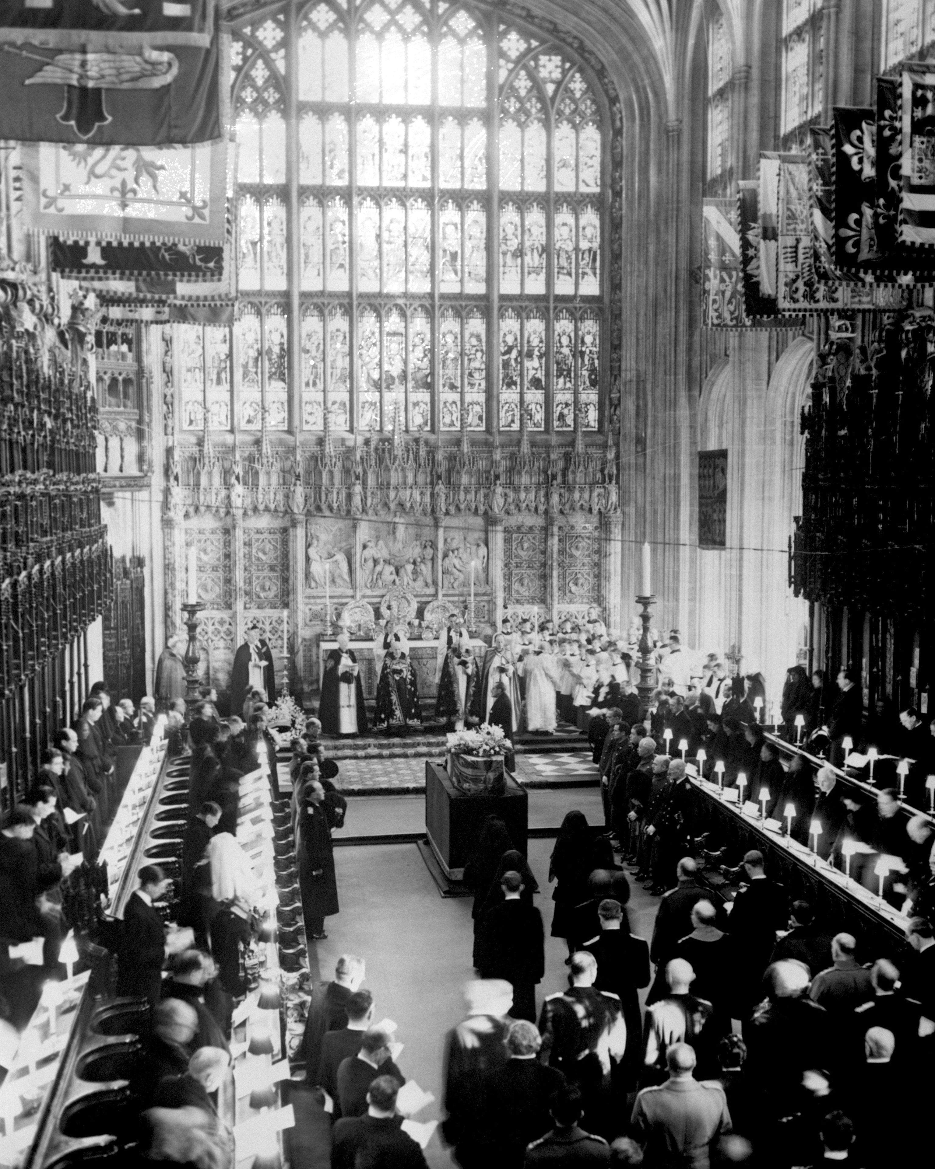 <p>This photo was taken during the funeral of King George VI at St. George's Chapel at Windsor Castle on Feb. 15, 1952. In front of the altar is the Archbishop of Canterbury, Dr. Geoffrey Fisher. </p><p>Immediately behind the late monarch's coffin are the heavily veiled Queen Elizabeth II, Queen Elizabeth the Queen Mother, Princess Margaret and the Princes Royal, King George VI's sister Princess Mary. </p>