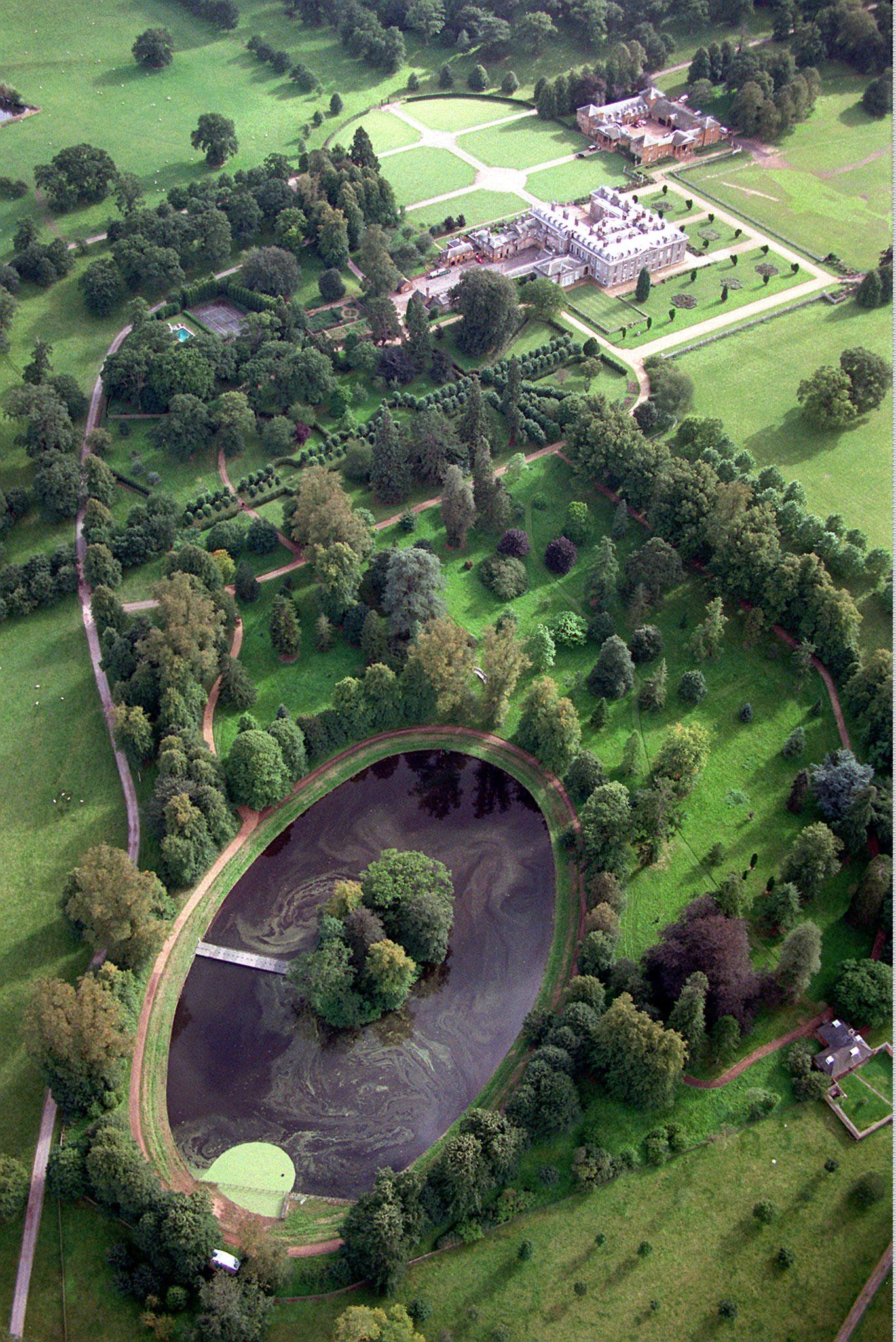 <p>This is an aerial view of the island in the ornamental lake known as The Round Oval on the grounds of the Spencer family estate in Althorp, England, where Princess Diana was buried following her funeral on Sept. 6, 1997.</p><p>There are 36 oak trees lining a path to the lake -- one for each year of her life.</p>