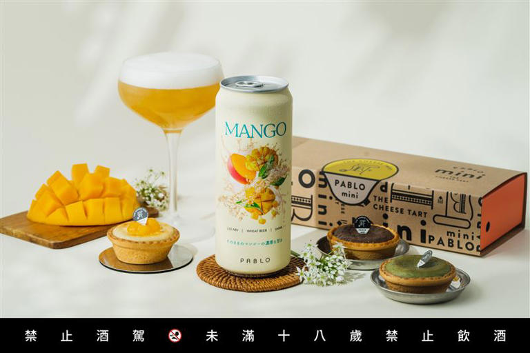 以PABLO季節限定「芒果mini起司塔」為靈感，SUNMAI金色三麥「芒果啤酒」選用台灣愛文品種，熱情滋味呼應芒果季的陽光。（圖／品牌業者提供）